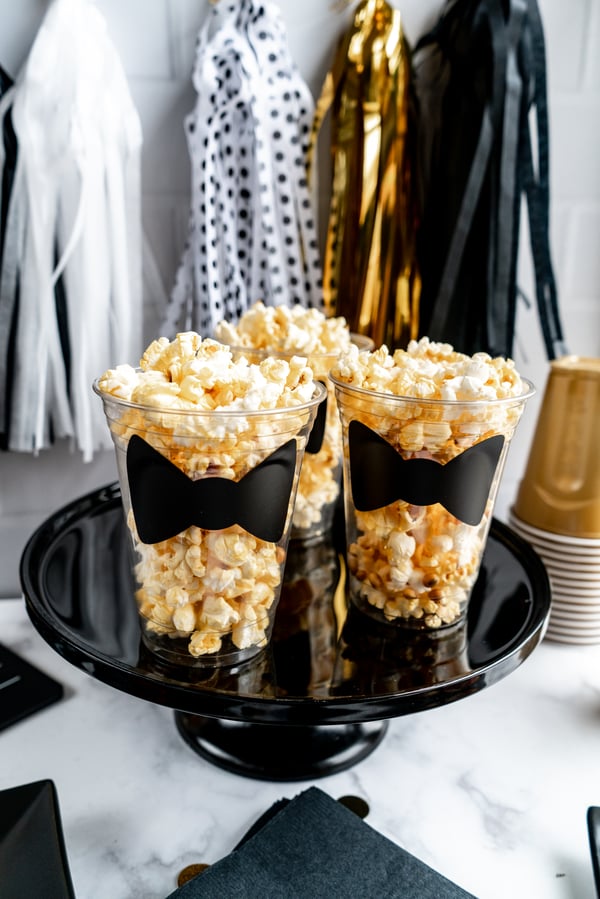 Popcorn cups embellished with bow ties